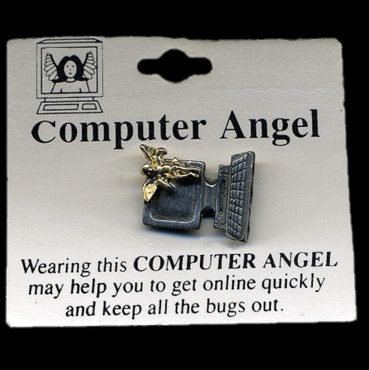 Pin of an angel in front of a computer with a note attached reading: 'COMPUTER ANGEL: Wearing this computer angel will help you get online quickly and keep all the bugs out'.
